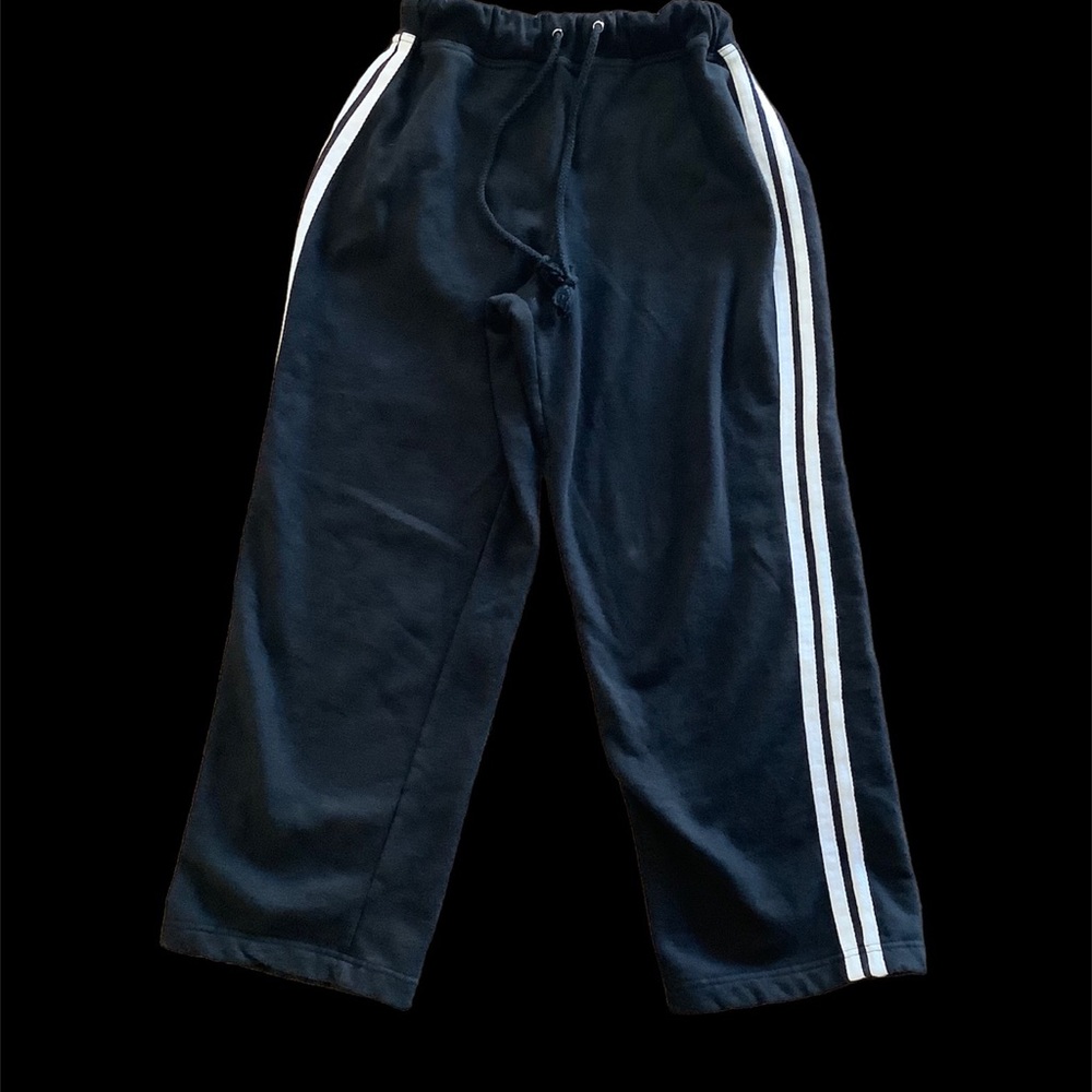 Black Sweatpants with White Racer Stripes Going down Sides